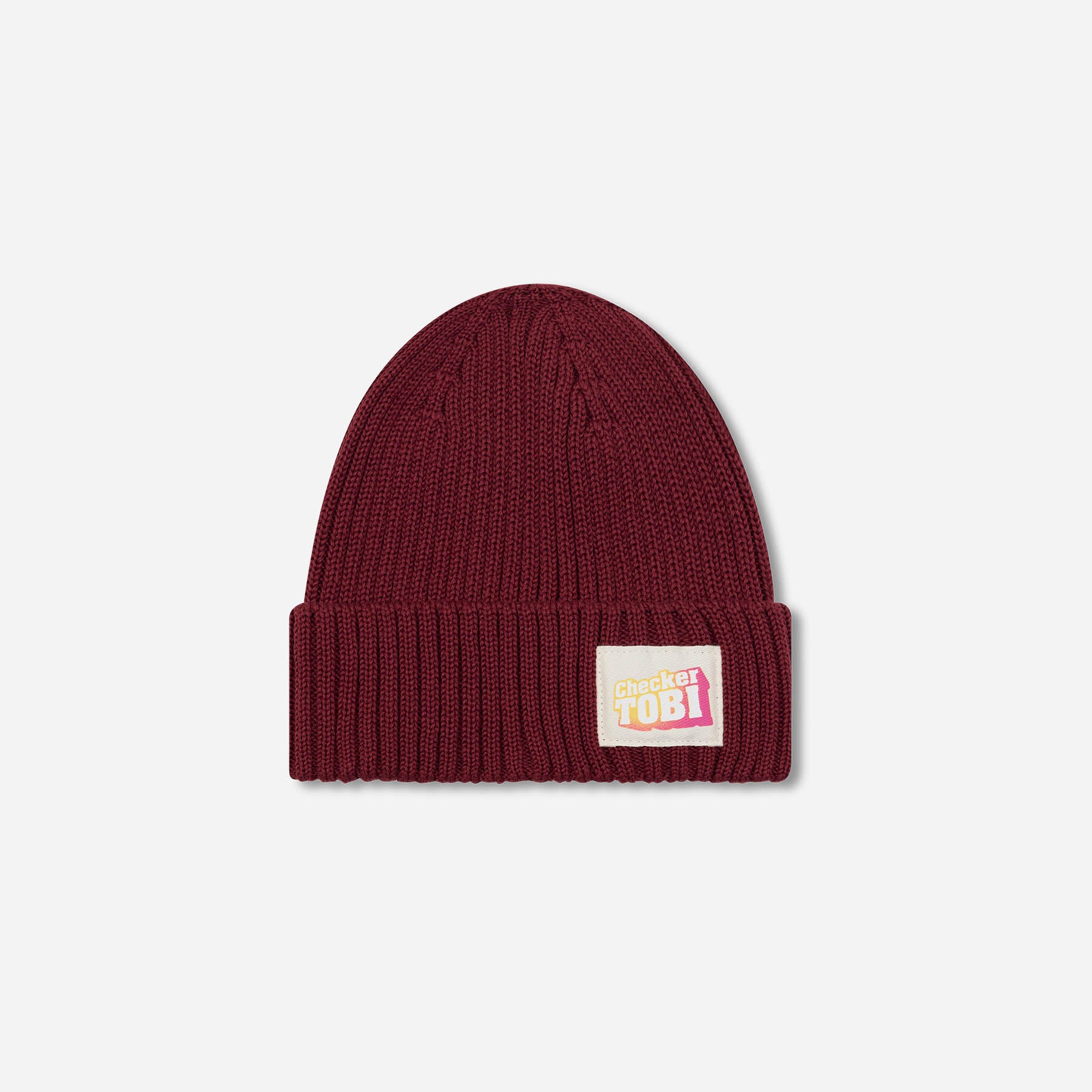 Checker Tobi LOGO Mütze in Redeva von PlayPlayPauly – Vorderansicht der Grobstrick-Beanie aus Bio-Baumwolle, Made in Germany.